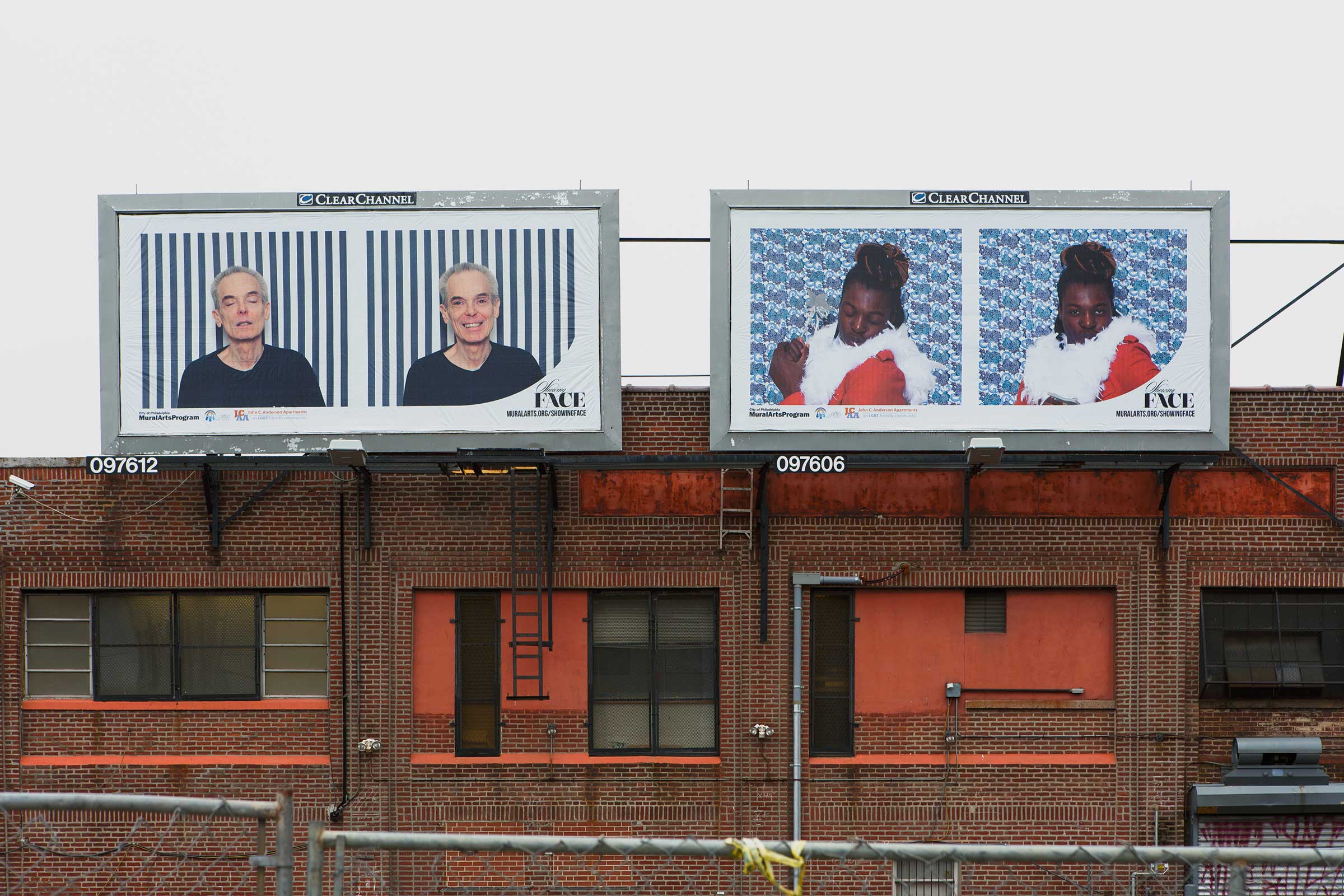 Photo of billboards showing two diptychs from Gayface